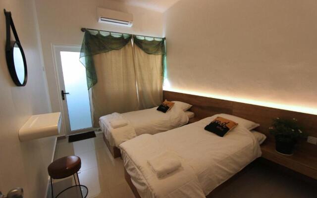 Tung's Tropika - With a Wooden Hut by a Lake