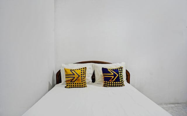 SPOT ON 92595 Umi Homestay Syariah