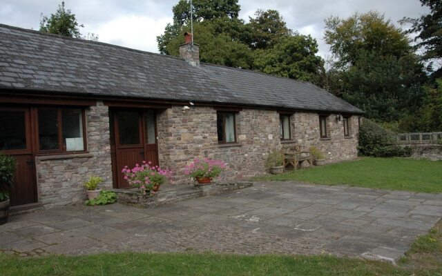 Cottage With Folding-doors in a Calm Environment Surrounded by Farming Fields