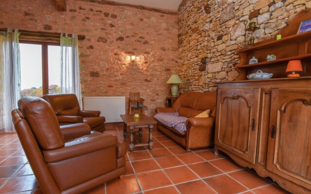 Lovely holiday home in Biron with fenced swimming pool