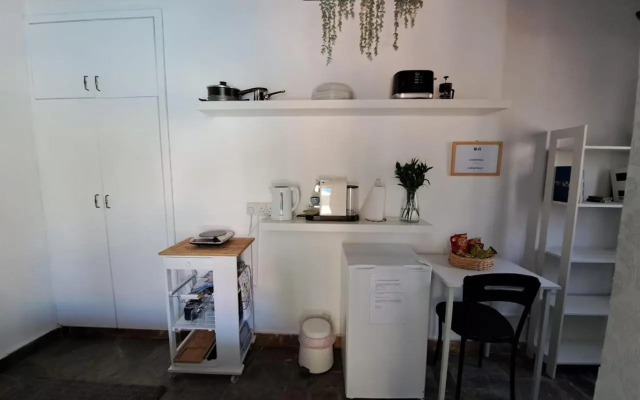 Mediterranean poolside garden cottage