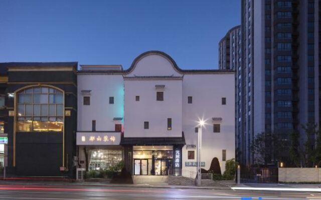 Yuanju Nashan Hotel (Zhengzhou Zhongyuan Wanda Tanshili Branch)