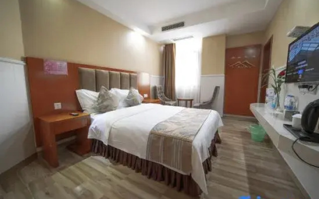 Yi Long Hua Chen Impress Business Hotel