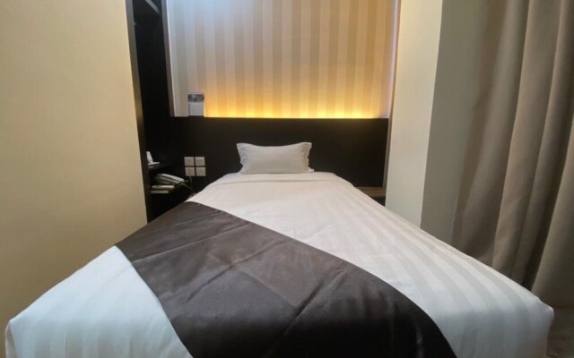 Capital O 90447 Hotel Ezzyhome Kebun Teh