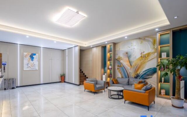 Xiangqing Qi'an Smart Hotel (Tunchang Central Commercial Plaza)