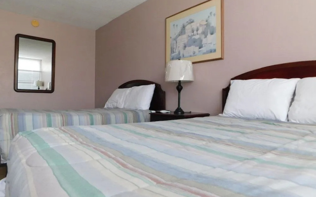 Apm Inn & Suites
