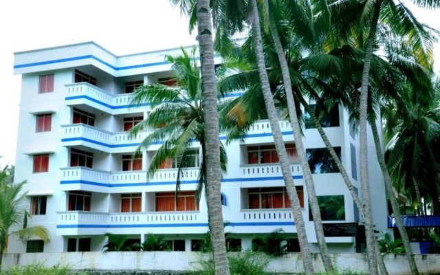 Vedanta Wake up! by Lighthouse Beach, Kovalam