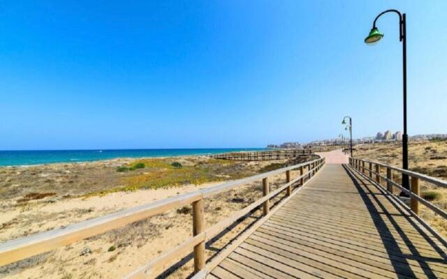 Apartment with pool & balcony less than 10min walk to La Mata Beach!