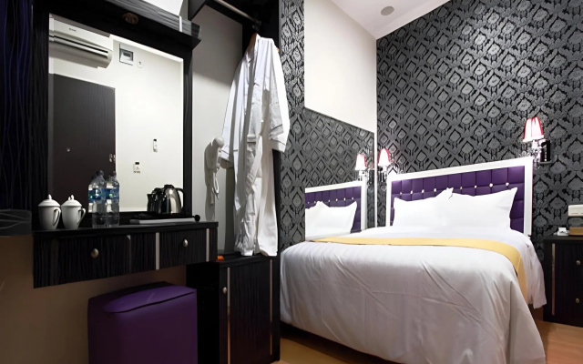 Amos Cozy Hotel & Convention Hall