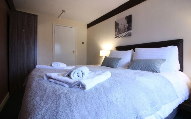 Roomtel Riverside Suites