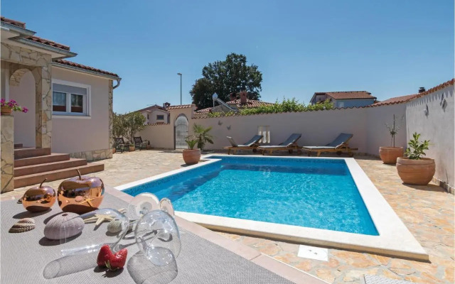 Three-Bedroom Holiday home Betiga with a Fireplace 02