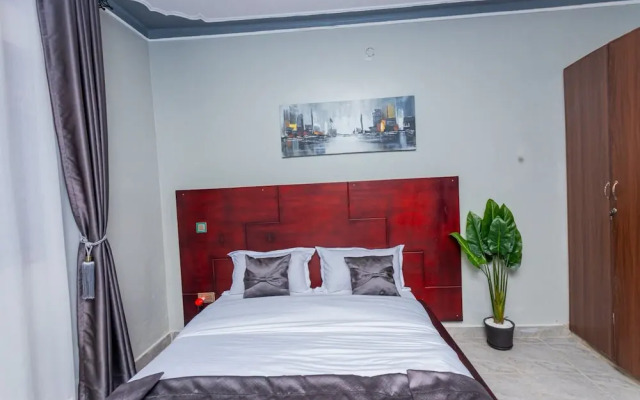 The Den Soroti White