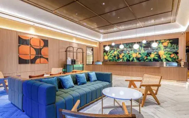Orange Hotel (Xishuangbanna Jinghong Menglong Dafosi Branch)