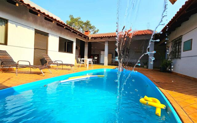 Casa Familiar 4 quartos Piscina e Churrasqueira
