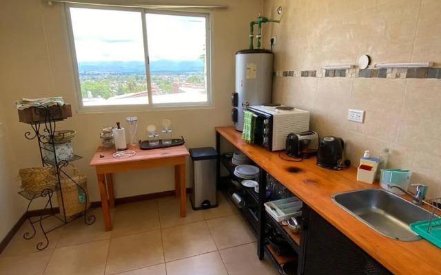 Departamento entre cerros y cielo