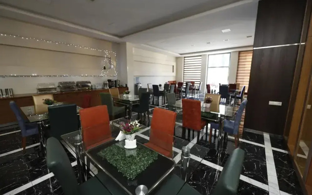 Olympus Hotel By Umbrella