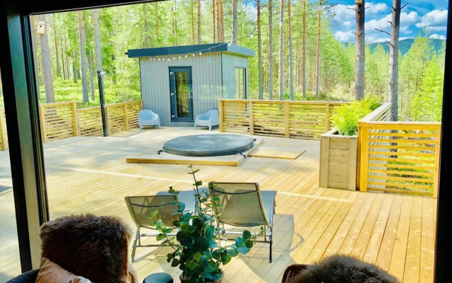 Skogly - Ny stor hytte, Unike Finnskogen
