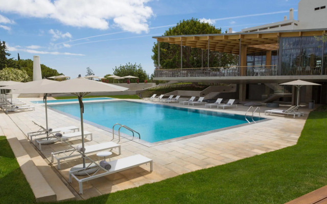 Ozadi Tavira Hotel
