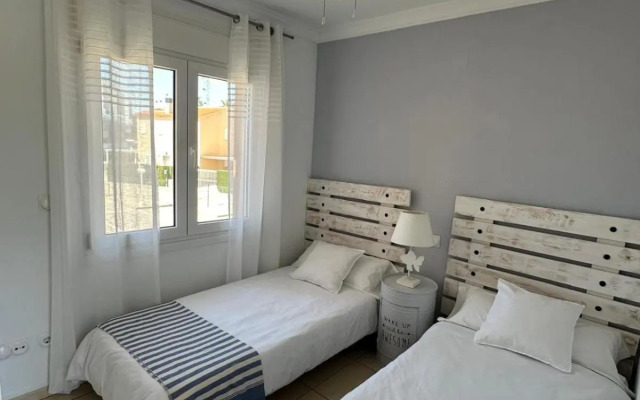 Oliva Nova flat in front of MET