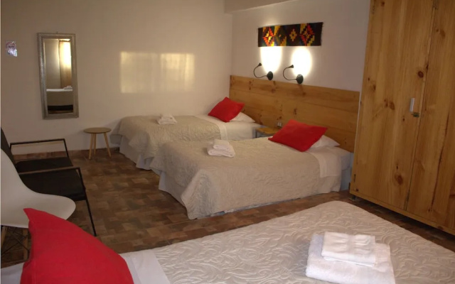 Peumayen Atacama / Hostal & Cabaña