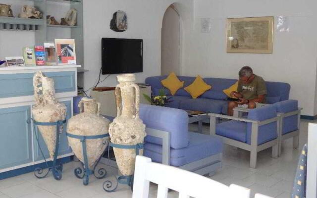 Remezzo Hotel & Studios