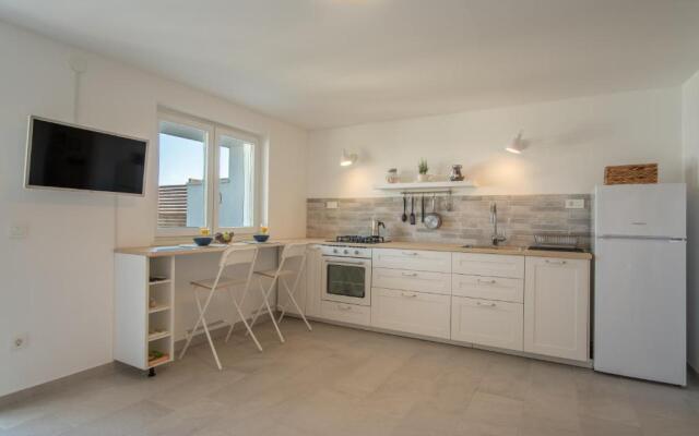 A White Cliffside Studio