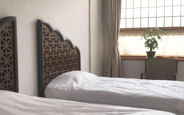 Manhong's Private Courtyard – Guest Rooms – Beijing