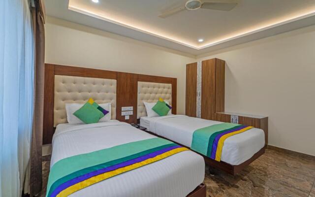 Treebo Aaravi Residency, 800 Mtrs From Promenade Beach
