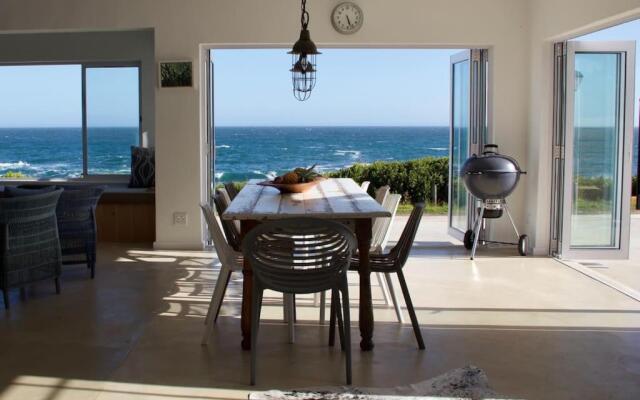 Seafront house with a view