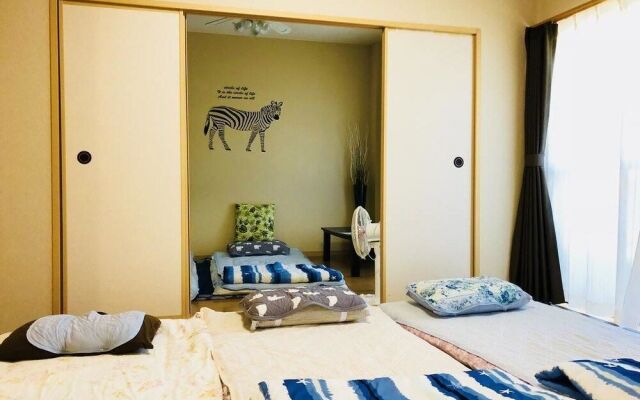 Midtown Sakura Apartment House 102 – Guest Rooms – Nachikatsuura