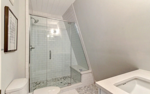 Roomy Chalet-Style Beachfront Condo with Private Beach Access by RedAwning