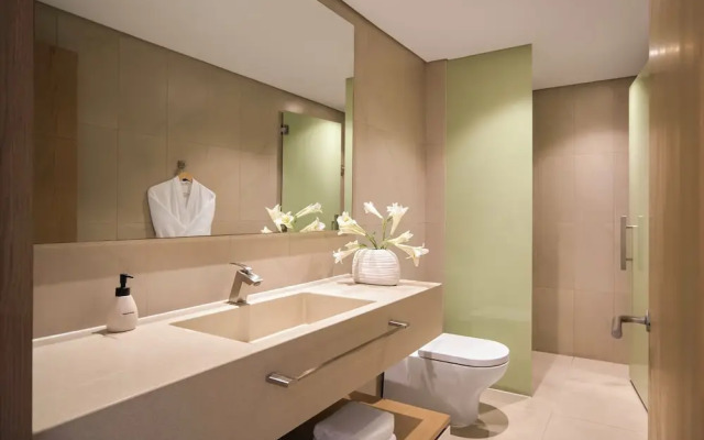 Signature By M Village Beachfront Hotel