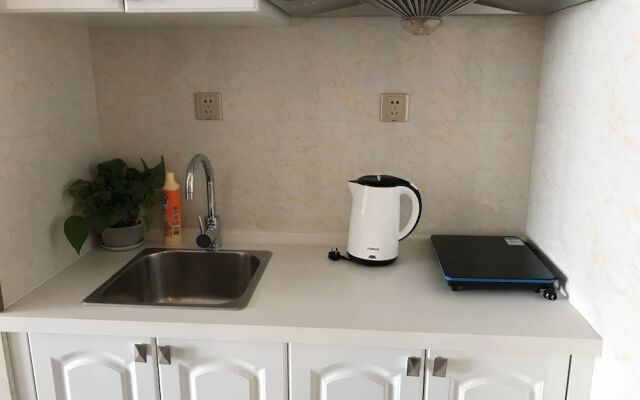 Dalian Xuanya Apartment