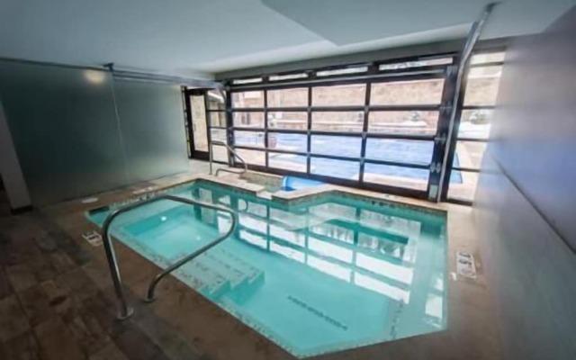 Northwoods Condo Private Ski-In Ski-Out Access to Vail Mountain by RedAwning