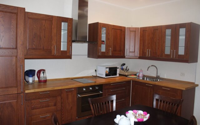 Na Chekistov 26 (158) Apartments