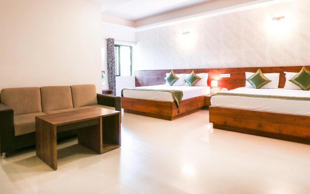 Treebo Comforts Inn, University Road Deralakatte