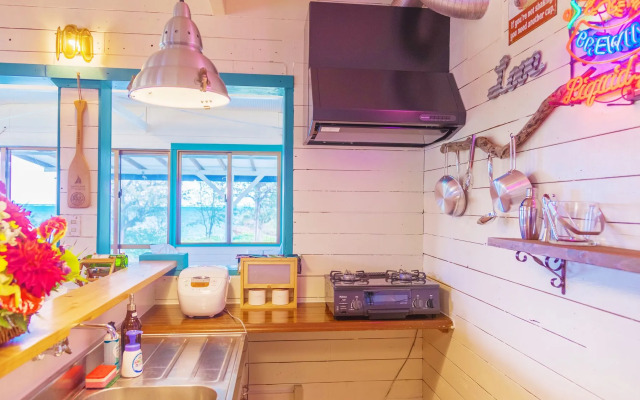 Kariyushi Condminium Resort Motobu THE BEACH GARDEN HOUSE