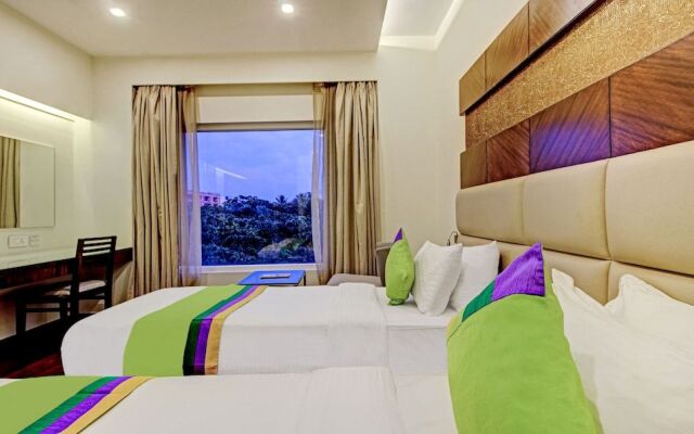 Treebo Trend Hotel Palladium Suites