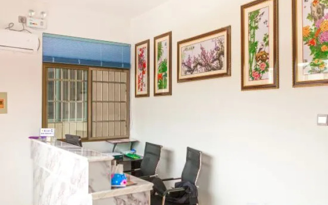 Xiuning Le Mei Hotel