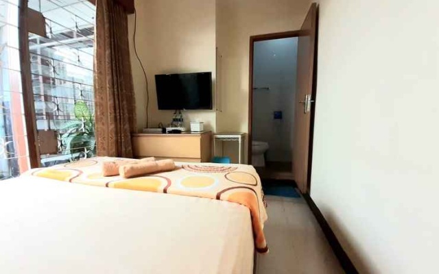 Gio Guesthouse near Terminal Baranangsiang – Guest Rooms – Bogor