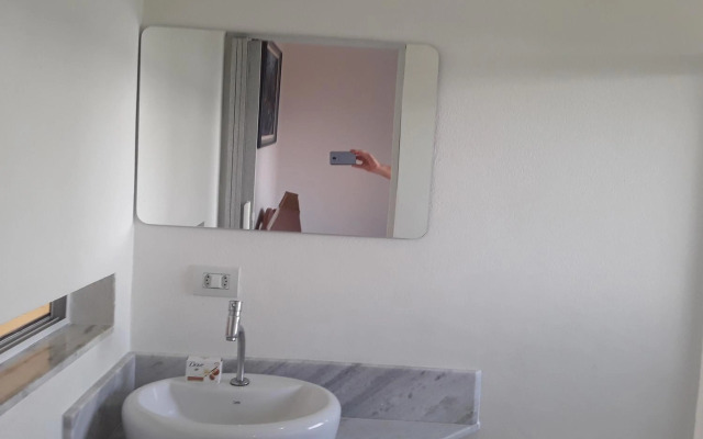 Honey Moon - Vista do mar na cama.