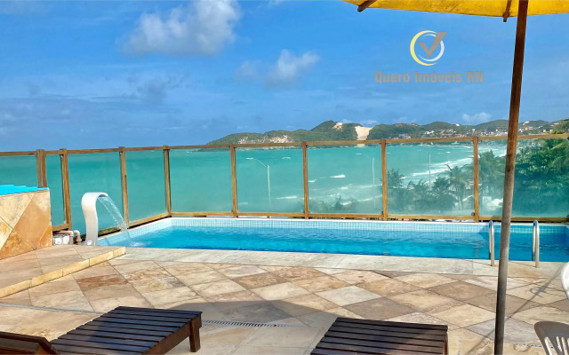 ES - Pé na areia em Ponta Negra