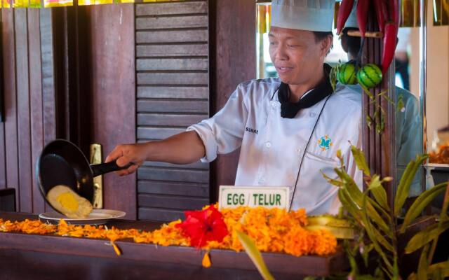 Отель Melasti Kuta Beach Hotel and Spa