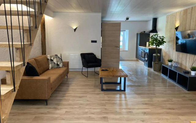 Wooden Soul : duplex 2 chambres avec jardin commun
