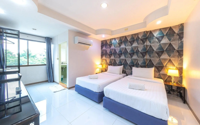 Bed by Tha-Pra Hotel and Apartment