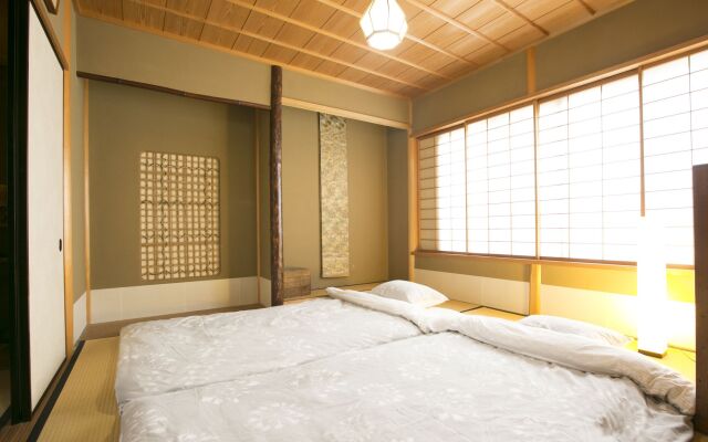 Nishinokyouharamachino Ie