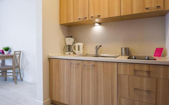 VacationClub - Aquamarina Apartment C-06