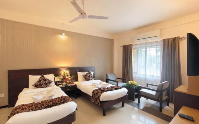 Hotel Pushpak Calicut International Airport