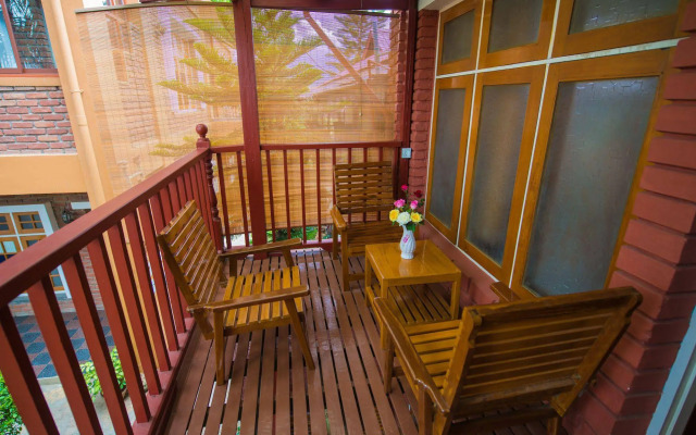 Teak Wood Hotel