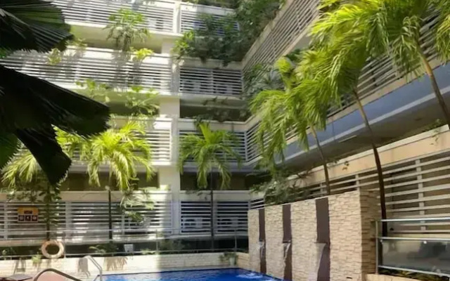Henry & Adiche  Emperador Building